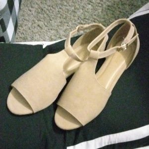 A pair of never worn tan soft suede sandals.